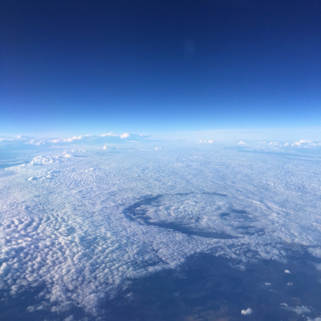 A bank of cloud seen from above, from the window of an aeroplane