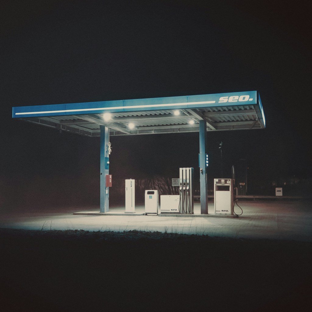 Photo of an empty petrol station at night